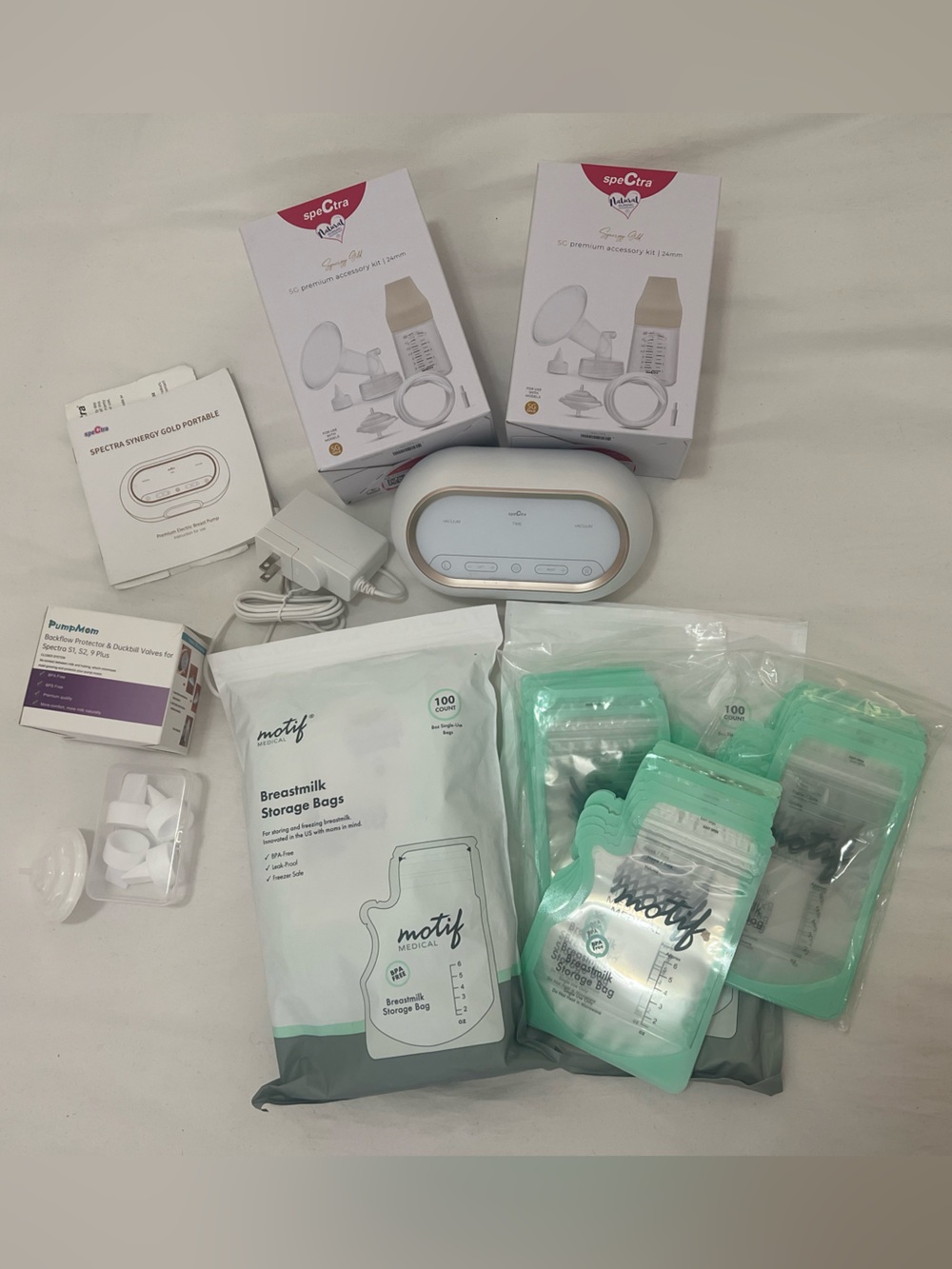 Spectra Synergy Gold Portable Breast Pump with Motif bags and accessories